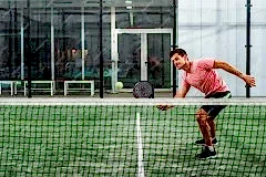 man-playing-padel